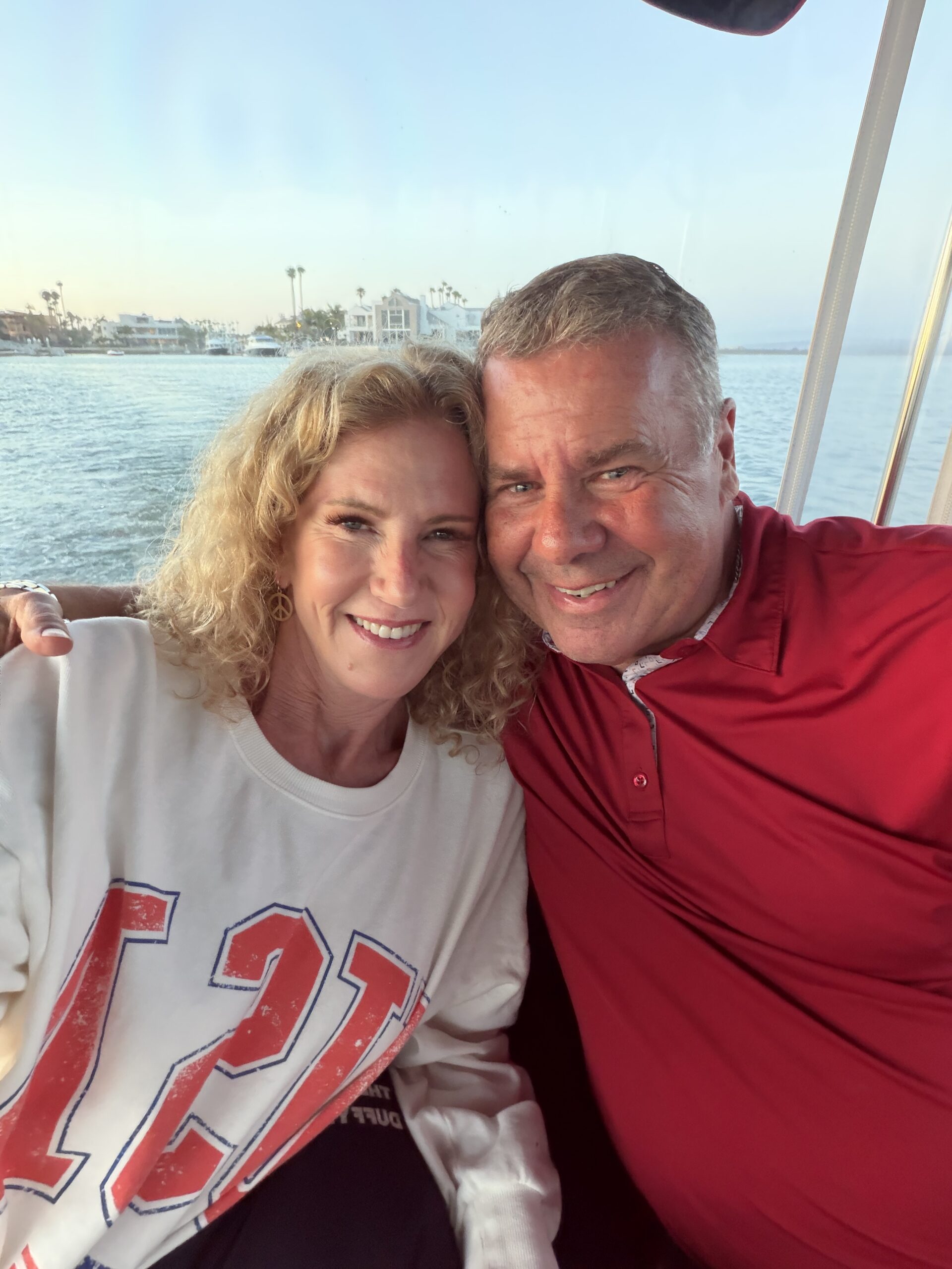 Tim and Kathy Bush smiling together by the water; their story shows healing is possible when both spouses are at fault